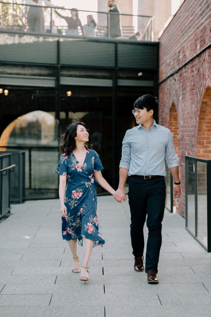 5 best DUMBO Brooklyn photography locations. Engagement Photo on rooftop of Time Out Market Building