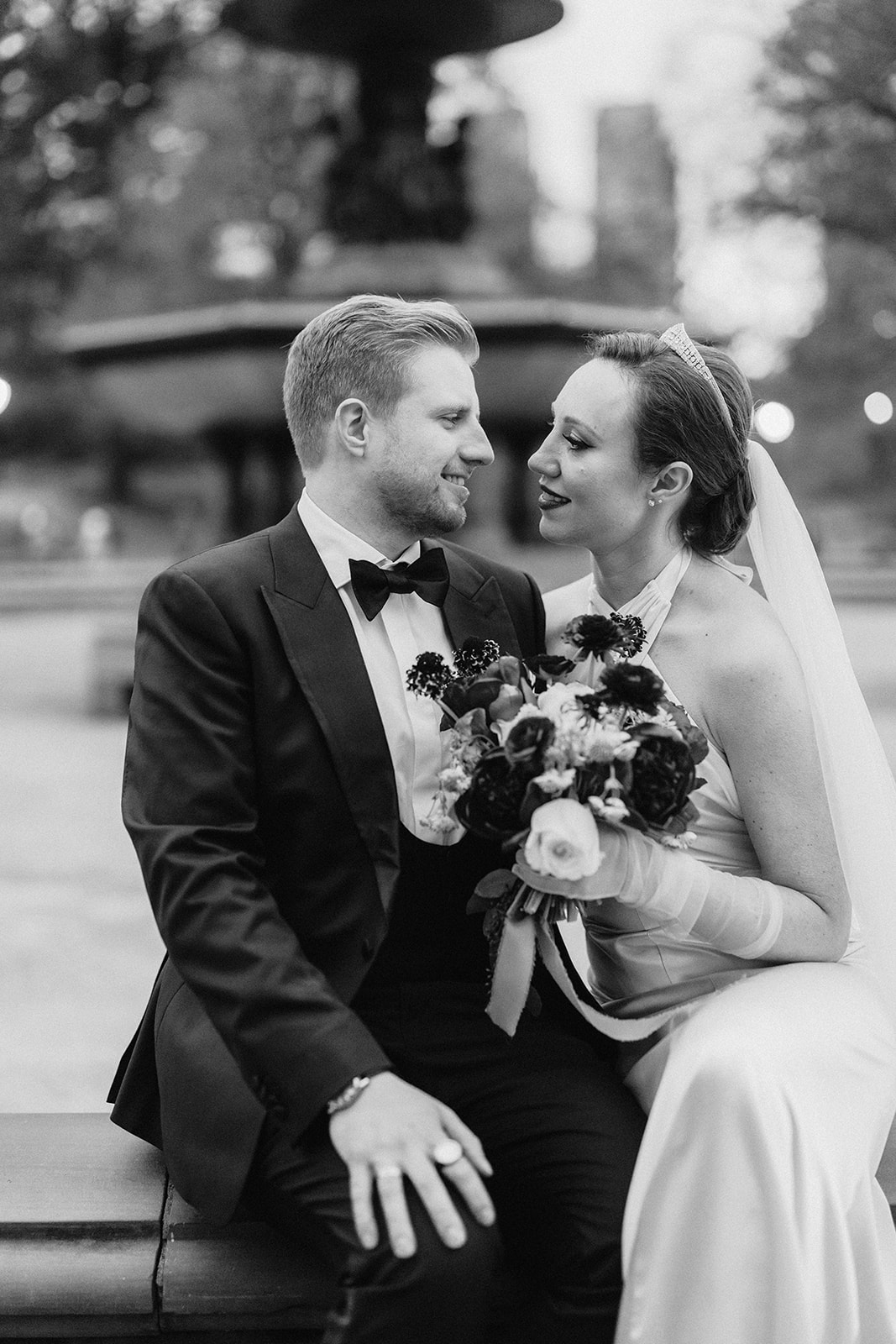 Black and white photo of newlywed couple in Central Park, captured by For Fearless Hearts