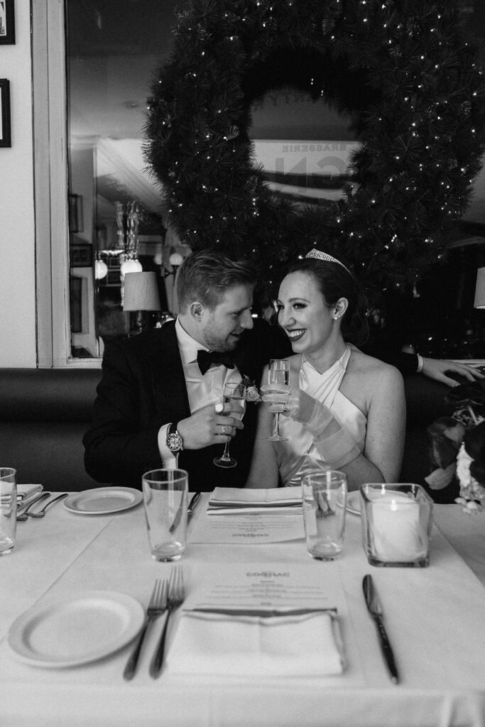 Wedding Photography and Videography Packages. Black and white photo of couple at the wedding reception.