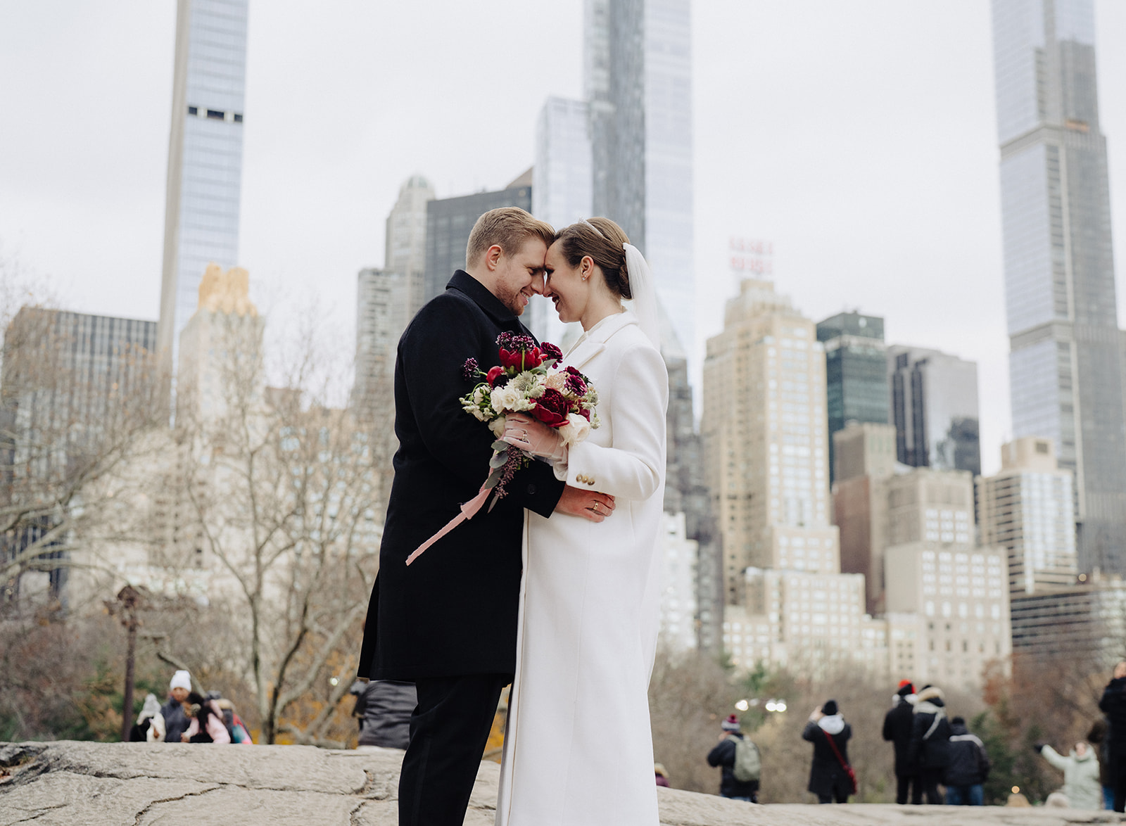 Bride and groom sharing an embrace during their New York wedding shoot with For Fearless Hearts